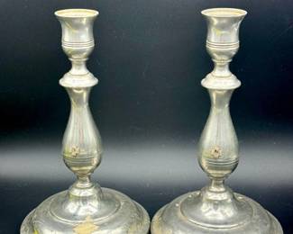 https://ctbids.com/estate-sale/31612/item/3566219/2-Kirk-Stieff-Pewter-Candlesticks