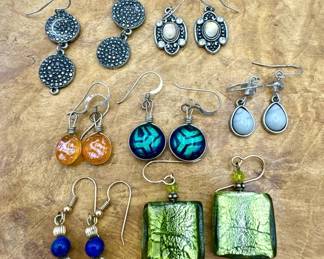 Jewelry earrings including art glass