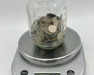 Unsearched coins in a jar