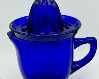 https://ctbids.com/estate-sale/31612/item/3566526/Summit-Art-Glass-Cobalt-Glass-Pitcher-Juice-Reamer