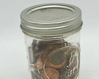 Unsearched collection of coins found in an old mason jar