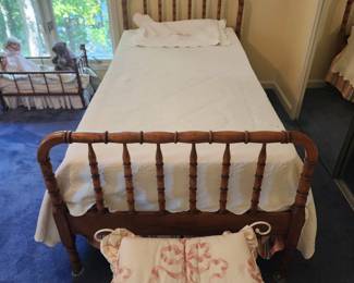 Vintage Jenny Lind style twin beds (2) with casters