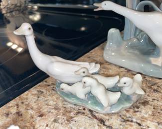 A group of LLadro figurines