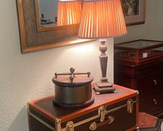 We have a great collection of unique passenger trunks with beautiful exterior details! 
Antique ship box
Mirror with blue and gold bird border - lovely ! 