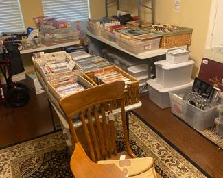 Office supplies
Books
Sheet music collection
Storage bins
Antique wood desk
Framed lace work