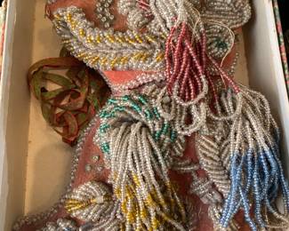 Antique beaded artwork. Shaped like a little boot.