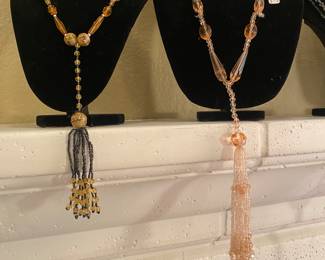 Flapper girl necklaces 