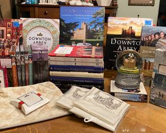 Downtown Abbey collection-
Books
Cook books
CD & DVD collection 
Tea pot cover 
Tea towels
Ornaments
Water globe 