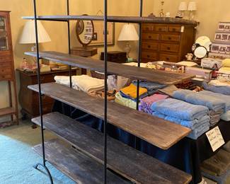 Very unique wrought iron and wood slat shelf. 