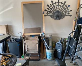 Peacock outdoor  wall art, folding chairs and chaise lounges, Electrolux vacuum cleaner