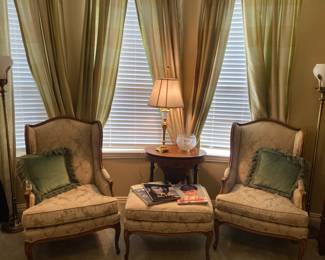 Beautiful pair of Baker  wingback chairs and ottoman