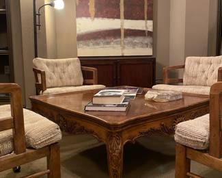 Set a four club chairs in excellent condition
Elegant wood coffee table
WOOD media cabinet
Large Abstract Contemporary art by Danna  Gann