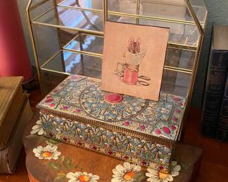 Vintage brass and glass display box
The prettiest vintage candy tin I’ve ever seen
Hand painted dresser box with daisies
