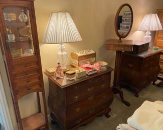 Pair of Baker Chippendale style, Bombay mahogany chests 
Decorative wood storage boxes
Glass and brass lamps