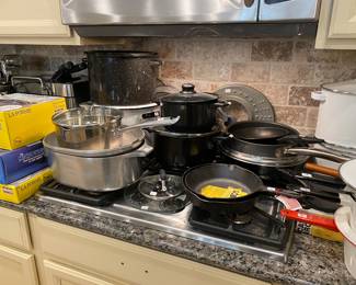 Pots and pans, including cast-iron, and an aluminum roaster