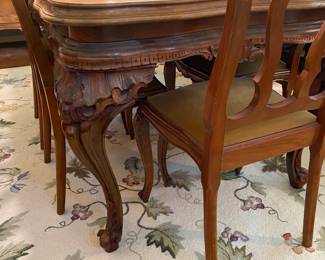 Traditional French design table and six chairs. 72“ x 39“.