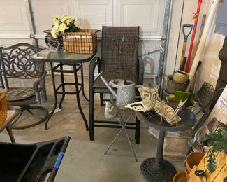 Bar height patio table $ 2 chairs (they are stacked), bird bath, yard art, 