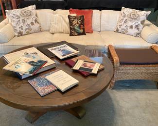 MCM round coffee table with glass top
Vintage MCM - very clean low sofa
Ratan Footstool