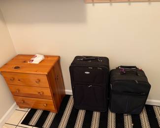 Hallway
Small dresser, luggage 