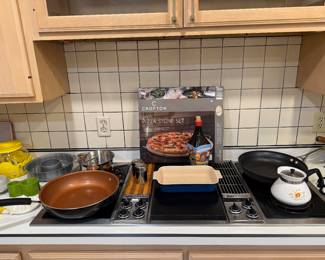 Kitchen 
Pizza stone new in box, le crueset 