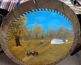 Primitive round saw blade mounted to wood