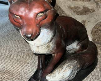 Two concrete easy to care for foxes 