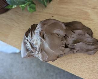 Even the broken pieces of sculpture would work great as plant/yard art!