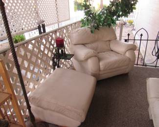 Leather furniture moved from inside home to outside patio area. Very comfortable, needs a good clean!