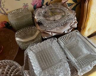house pic depression glass includes plates, bowls, cruets, pitchers, and vases.