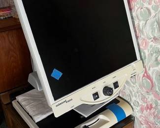 house pic Merlin desktop vision enhancing machine for those with failing eyesight