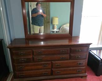 Bedroom dresser with mirror.