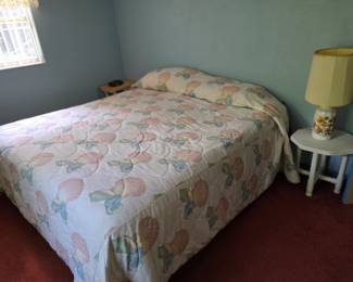 Bed and side tables and lamp.