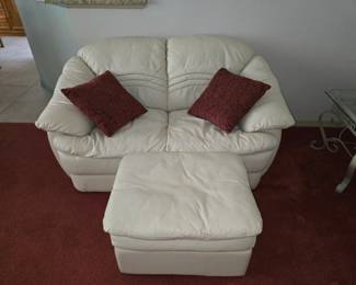 White leather love seat and ottoman