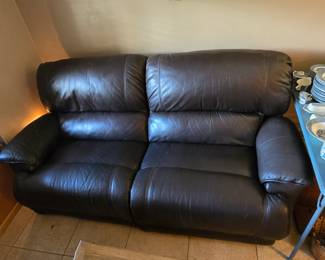 Leather power recliner love seat.