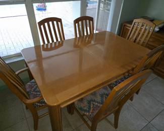 Bassett dining table six chairs.