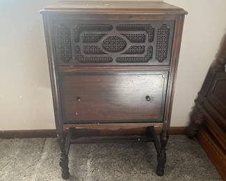 Vintage cabinet. Radio has been removed.