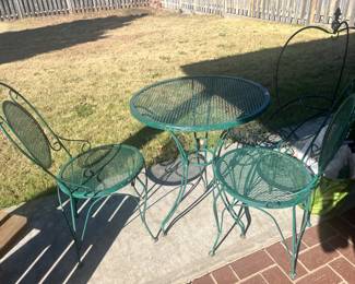 Cute wrought, iron patio table, and chairs