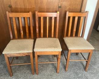 Three wood side chairs