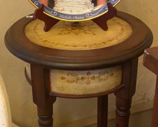 plant stand and collectible Michelle Obama plate