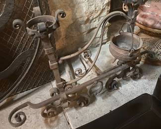 SPECIAL! from this fireplace, antique andirons and a cooking pot on a swivel arm. This is not something you see every day!