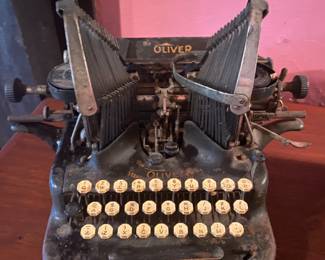 Oliver "batwing" very early manual typewriter, with metal cover...so COOL