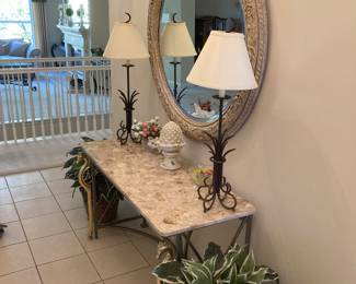 Marble top entrance table with brass seahorse front