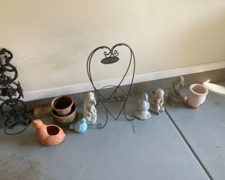 More outdoor statues and plant holders