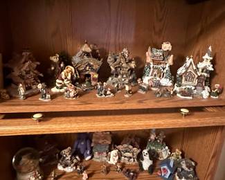 Inside the bookcase is an HUGE collection of Boyd Bear Figurines!