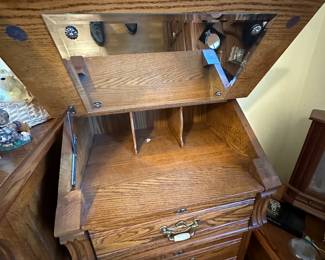 A beautiful SOLID OAK LEXINGTON Bedroom ensemble! A LARGE dresser with mirror, a Tall Boy Dresser w/cupboard, A night Stand, and a Tall undergarment dresser with makeup/jewelery mirror!