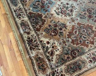 This is a beautiful 8x11 living room carpet! Beautiful burgundy, hunter green oriental style earthtone color scheme!