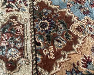 This is a beautiful 8x11 living room carpet! Beautiful burgundy, hunter green oriental style earthtone color scheme!