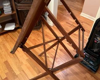 This is an unusual piece. It is a wooden, adjustable easel for painting! It has on it a great old vintage Last Supper outline.