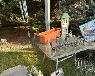 Several wind chimes around the property! Also a Bunch of patio side tables, planters, etc...