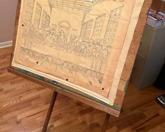 This is an unusual piece. It is a wooden, adjustable easel for painting! It has on it a great old vintage Last Supper outline.